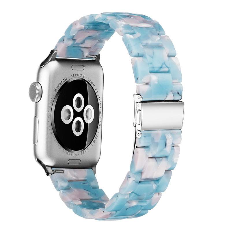 Aurora premium Apple resin watch band with unique marbled patterns and polished finish on an Apple Watch